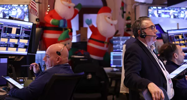 Traders work on the floor of the New York Stock Exchange 